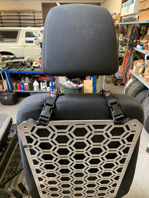 Adapt-a-grid modular seat back panel