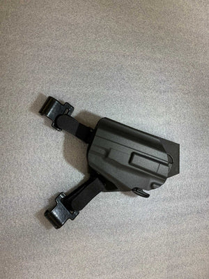 Universal under steering column pistol carrier