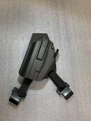 Universal under steering column pistol carrier