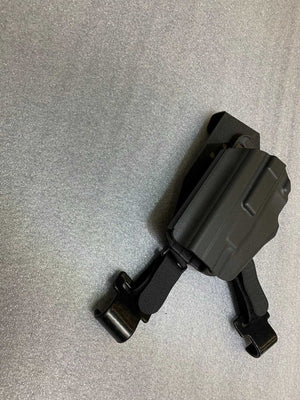 Universal under steering column pistol carrier